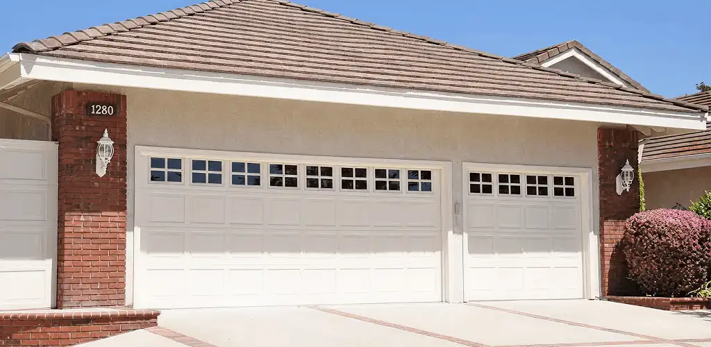 Residential garage door repair service for a double garage door in Scottsdale, AZ