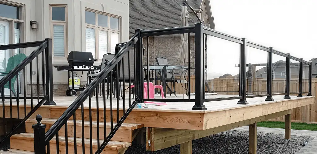 Handrail installation on a deck staircase for safety and code compliance in Scottsdale, AZ