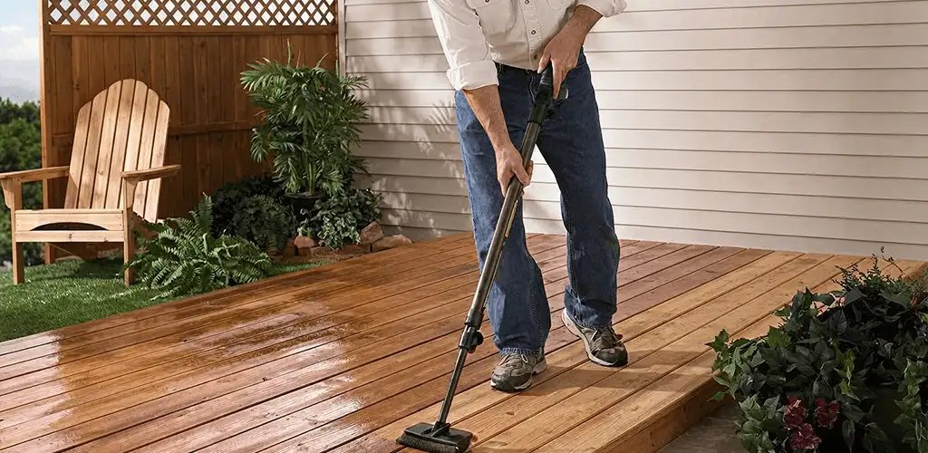 Deck staining service applying stain to a backyard wood deck in Scottsdale, AZ